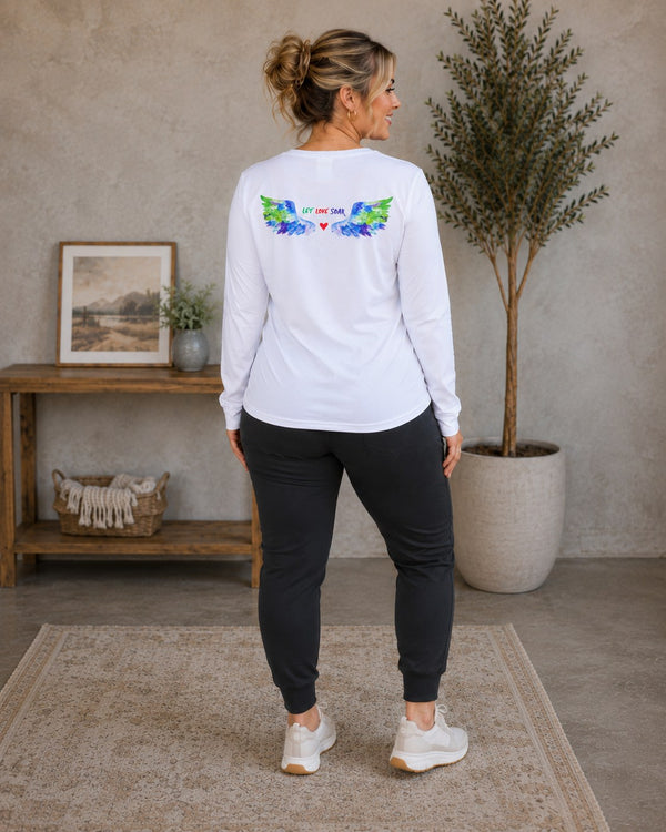 Back view of the Lolly Dagger Let Love Soar long sleeve tee in White, Multi-Colored Wings design.